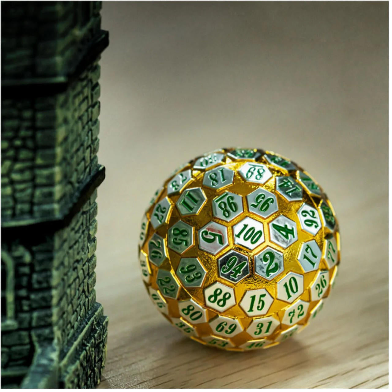 Foam Brain Games 45mm Metal D100 - Gold and Silver with Green